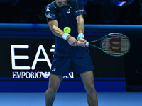 Alex de Minaur (AUS) competes against Taylor Fritz (USA) during day five of the Nitto ATP finals 2024 at Inalpi Arena in Turin, Italy, on No...