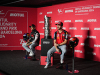 Jorge Martin (L) of Spain and Prima Pramac Racing Ducati and Francesco Pecco Bagnaia (R) of Italy and Ducati Lenovo Team during the press co...