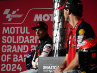 Jorge Martin (L) of Spain and Prima Pramac Racing Ducati and Francesco Pecco Bagnaia (R) of Italy and Ducati Lenovo Team during the press co...