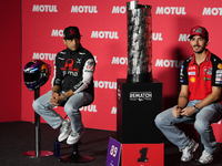 Jorge Martin (L) of Spain and Prima Pramac Racing Ducati and Francesco Pecco Bagnaia (R) of Italy and Ducati Lenovo Team during the press co...