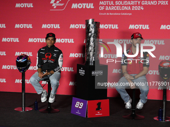 Jorge Martin (L) of Spain and Prima Pramac Racing Ducati and Francesco Pecco Bagnaia (R) of Italy and Ducati Lenovo Team during the press co...