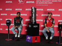 Jorge Martin (L) of Spain and Prima Pramac Racing Ducati and Francesco Pecco Bagnaia (R) of Italy and Ducati Lenovo Team during the press co...