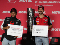 Jorge Martin (L) of Spain and Prima Pramac Racing Ducati and Francesco Pecco Bagnaia (R) of Italy and Ducati Lenovo Team during the press co...