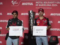 Jorge Martin (L) of Spain and Prima Pramac Racing Ducati and Francesco Pecco Bagnaia (R) of Italy and Ducati Lenovo Team during the press co...