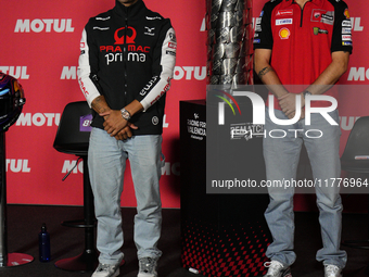 Jorge Martin (L) of Spain and Prima Pramac Racing Ducati and Francesco Pecco Bagnaia (R) of Italy and Ducati Lenovo Team during the press co...