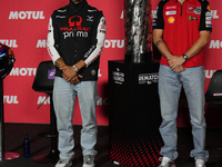 Jorge Martin (L) of Spain and Prima Pramac Racing Ducati and Francesco Pecco Bagnaia (R) of Italy and Ducati Lenovo Team during the press co...