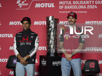 Jorge Martin (L) of Spain and Prima Pramac Racing Ducati and Francesco Pecco Bagnaia (R) of Italy and Ducati Lenovo Team during the press co...