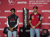 Jorge Martin (L) of Spain and Prima Pramac Racing Ducati and Francesco Pecco Bagnaia (R) of Italy and Ducati Lenovo Team during the press co...