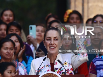 Mexico's President, Claudia Sheinbaum Pardo, speaks during the Original Textile Art Meeting, accompanied by indigenous craftswomen from diff...