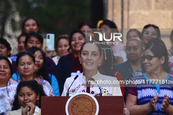 Mexico's President, Claudia Sheinbaum Pardo, speaks during the Original Textile Art Meeting, accompanied by indigenous craftswomen from diff...