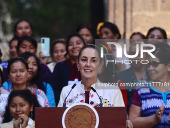 Mexico's President, Claudia Sheinbaum Pardo, speaks during the Original Textile Art Meeting, accompanied by indigenous craftswomen from diff...