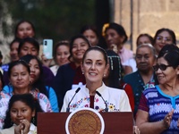 Mexico's President, Claudia Sheinbaum Pardo, speaks during the Original Textile Art Meeting, accompanied by indigenous craftswomen from diff...