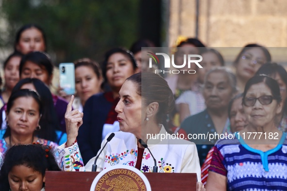 Mexico's President, Claudia Sheinbaum Pardo, speaks during the Original Textile Art Meeting, accompanied by indigenous craftswomen from diff...