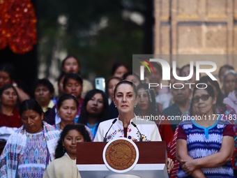 Mexico's President, Claudia Sheinbaum Pardo, speaks during the Original Textile Art Meeting, accompanied by indigenous craftswomen from diff...