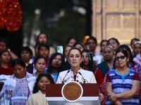 Mexico's President, Claudia Sheinbaum Pardo, speaks during the Original Textile Art Meeting, accompanied by indigenous craftswomen from diff...