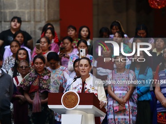 Mexico's President, Claudia Sheinbaum Pardo, speaks during the Original Textile Art Meeting, accompanied by indigenous craftswomen from diff...