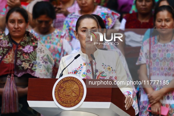 Mexico's President, Claudia Sheinbaum Pardo, speaks during the Original Textile Art Meeting, accompanied by indigenous craftswomen from diff...