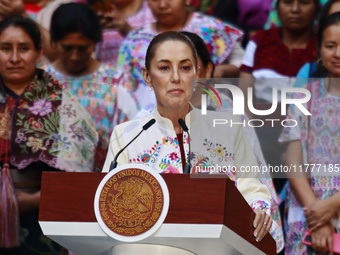 Mexico's President, Claudia Sheinbaum Pardo, speaks during the Original Textile Art Meeting, accompanied by indigenous craftswomen from diff...