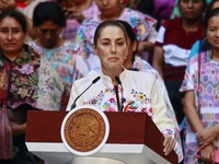 Mexico's President, Claudia Sheinbaum Pardo, speaks during the Original Textile Art Meeting, accompanied by indigenous craftswomen from diff...