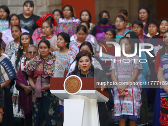 Mexico City Chief of Government Clara Brugada speaks during the Original Textile Art Meeting, accompanied by indigenous craftswomen from dif...