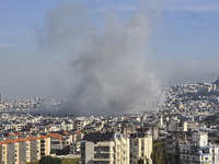 Smoke rises from a residential area after a series of Israeli airstrikes on the Dahieh region in southern Beirut, Lebanon, on November 14, 2...