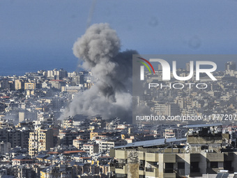 Smoke rises from a residential area after a series of Israeli airstrikes on the Dahieh region in southern Beirut, Lebanon, on November 14, 2...