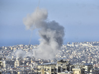 Smoke rises from a residential area after a series of Israeli airstrikes on the Dahieh region in southern Beirut, Lebanon, on November 14, 2...