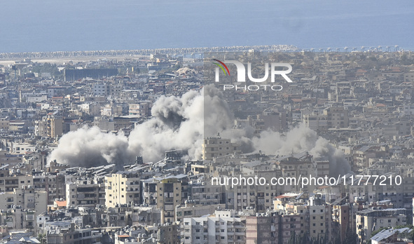 Smoke rises from a residential area after a series of Israeli airstrikes on the Dahieh region in southern Beirut, Lebanon, on November 14, 2...