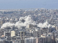 Smoke rises from a residential area after a series of Israeli airstrikes on the Dahieh region in southern Beirut, Lebanon, on November 14, 2...