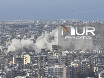 Smoke rises from a residential area after a series of Israeli airstrikes on the Dahieh region in southern Beirut, Lebanon, on November 14, 2...