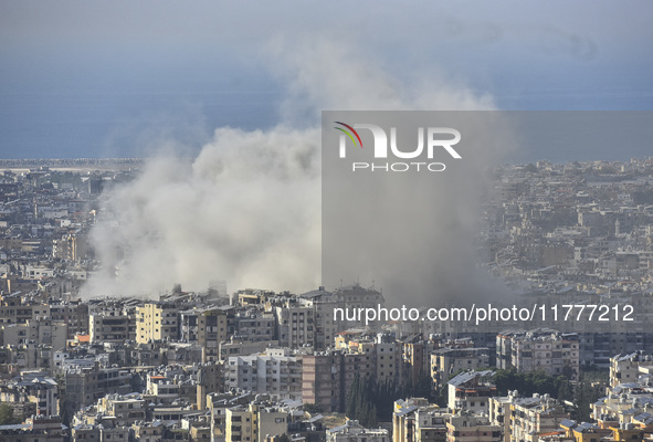 Smoke rises from a residential area after a series of Israeli airstrikes on the Dahieh region in southern Beirut, Lebanon, on November 14, 2...