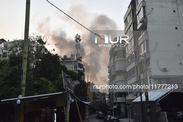 Smoke rises from a residential area after a series of Israeli airstrikes on the Dahieh region in southern Beirut, Lebanon, on November 14, 2...