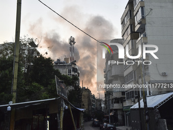 Smoke rises from a residential area after a series of Israeli airstrikes on the Dahieh region in southern Beirut, Lebanon, on November 14, 2...