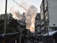 Smoke rises from a residential area after a series of Israeli airstrikes on the Dahieh region in southern Beirut, Lebanon, on November 14, 2...