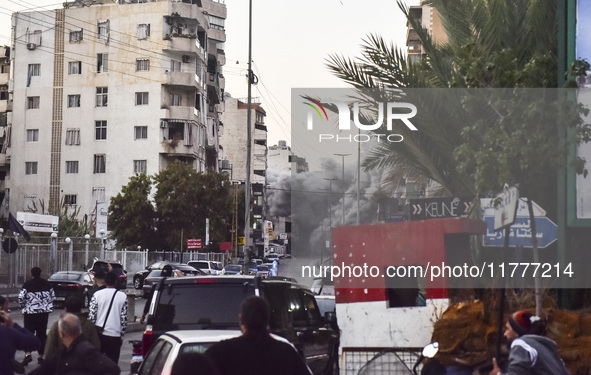 Smoke rises from a residential area after a series of Israeli airstrikes on the Dahieh region in southern Beirut, Lebanon, on November 14, 2...