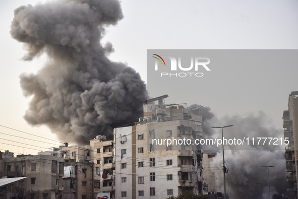 Smoke rises from a residential area after a series of Israeli airstrikes on the Dahieh region in southern Beirut, Lebanon, on November 14, 2...