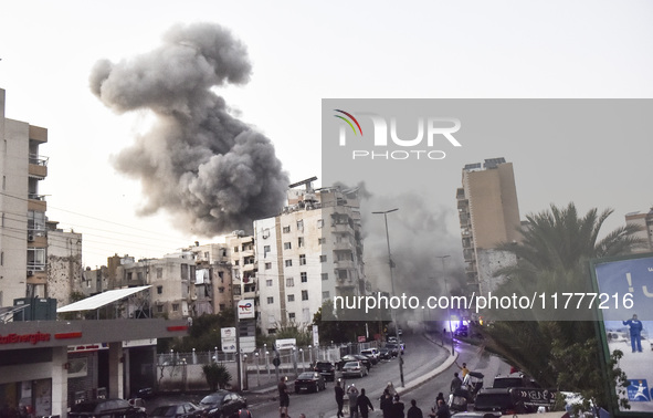 Smoke rises from a residential area after a series of Israeli airstrikes on the Dahieh region in southern Beirut, Lebanon, on November 14, 2...