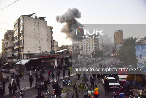 Smoke rises from a residential area after a series of Israeli airstrikes on the Dahieh region in southern Beirut, Lebanon, on November 14, 2...