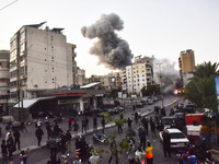 Smoke rises from a residential area after a series of Israeli airstrikes on the Dahieh region in southern Beirut, Lebanon, on November 14, 2...