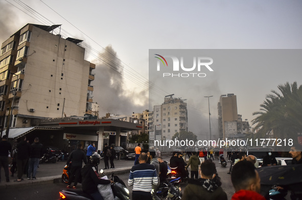 Smoke rises from a residential area after a series of Israeli airstrikes on the Dahieh region in southern Beirut, Lebanon, on November 14, 2...