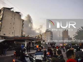 Smoke rises from a residential area after a series of Israeli airstrikes on the Dahieh region in southern Beirut, Lebanon, on November 14, 2...