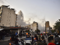 Smoke rises from a residential area after a series of Israeli airstrikes on the Dahieh region in southern Beirut, Lebanon, on November 14, 2...