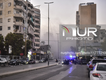 Smoke rises from a residential area after a series of Israeli airstrikes on the Dahieh region in southern Beirut, Lebanon, on November 14, 2...