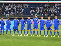 Players of Kuwait stand for their national anthem during the AFC Asian Qualifiers Road to 26 match between Kuwait and Korea Republic in Kuwa...