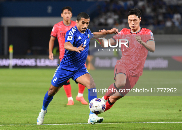 Sami Al Sanea of Kuwait competes against Park Yongwoo of Korea Republic during the AFC Asian Qualifiers Road to 26 match between Kuwait and...