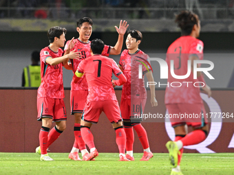 Oh Sehun, number 19 of Korea Republic, celebrates with teammates after scoring a goal during the AFC Asian Qualifiers Road to 26 match betwe...