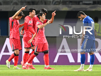 Players of Korea Republic celebrate after scoring a goal during the AFC Asian Qualifiers Road to 26 match between Kuwait and Korea Republic...