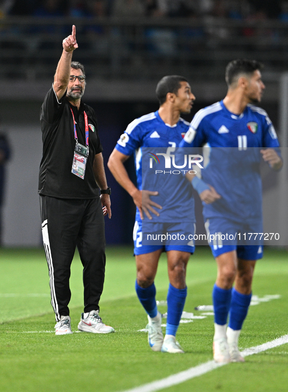 Head Coach of the Kuwait National team, Juan Pizzi (L), reacts during the AFC Asian Qualifiers Road to 26 match between Kuwait and Korea Rep...