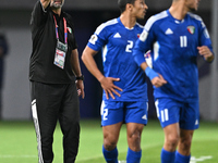 Head Coach of the Kuwait National team, Juan Pizzi (L), reacts during the AFC Asian Qualifiers Road to 26 match between Kuwait and Korea Rep...