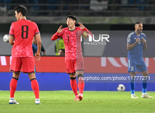 Son Heung Min (C) of Korea Republic is in action during the AFC Asian Qualifiers Road to 26 match between Kuwait and Korea Republic in Kuwai...